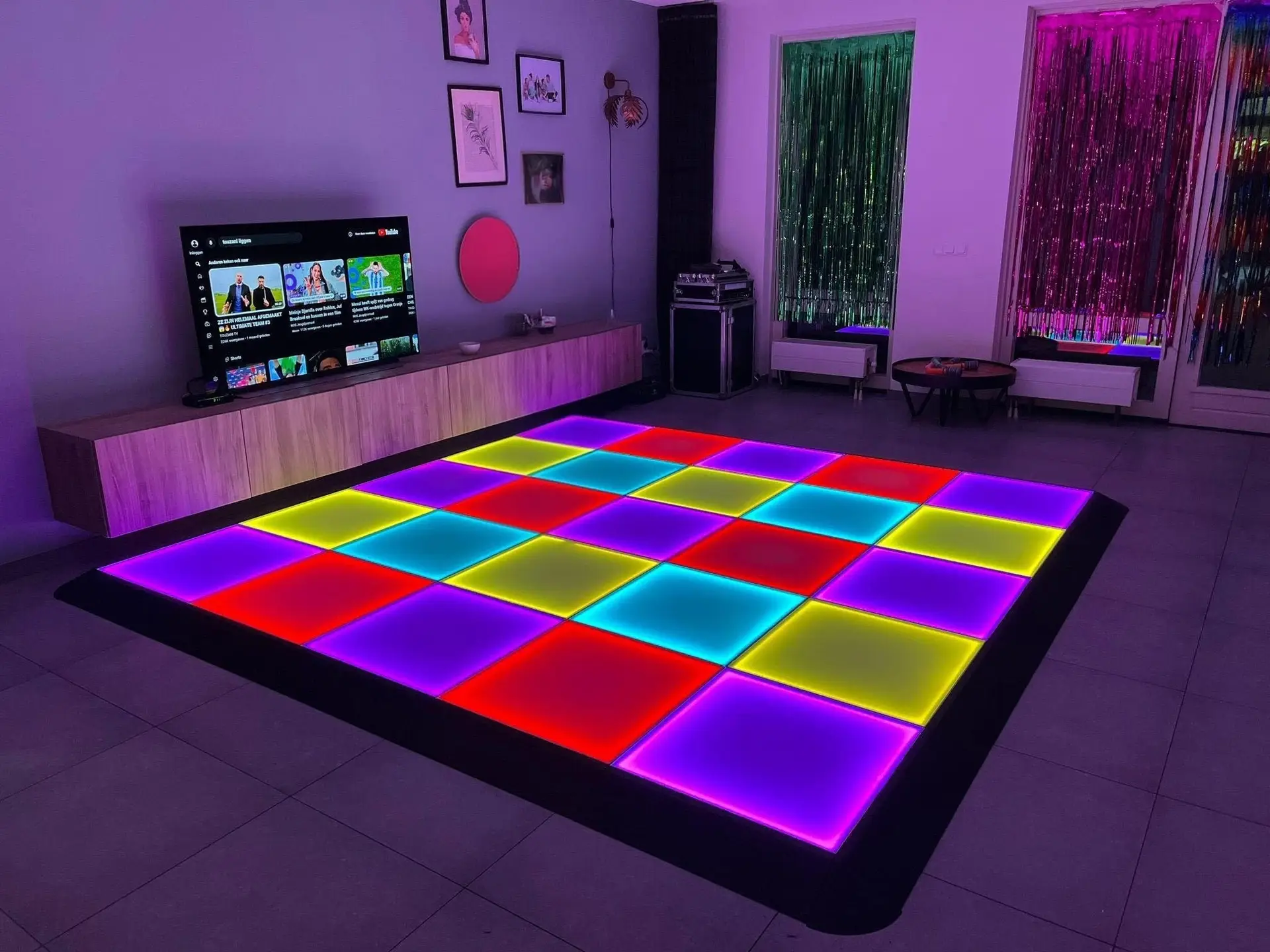 Illuminated dance floor with guests